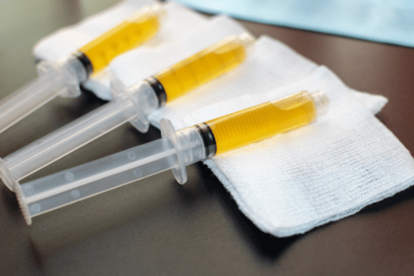 syringes filled with platelet rich plasma